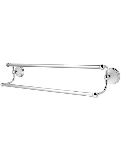 24 inch Cumberland Dual Towel Bar with Brass and White Porcelain Rosettes in Polished Chrome.